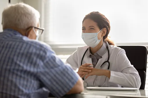 A doctor consulting with a senior resident